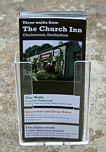 Leaflets in dispenser